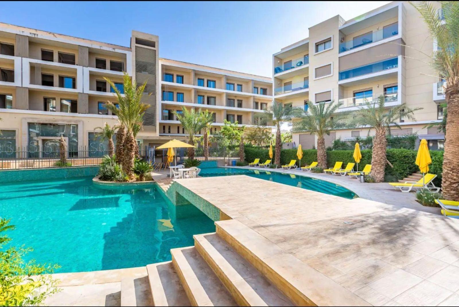 Appartement Luxueux Avec Piscine 10 Minutes Du Centre Ville Marrakesh Bagian luar foto