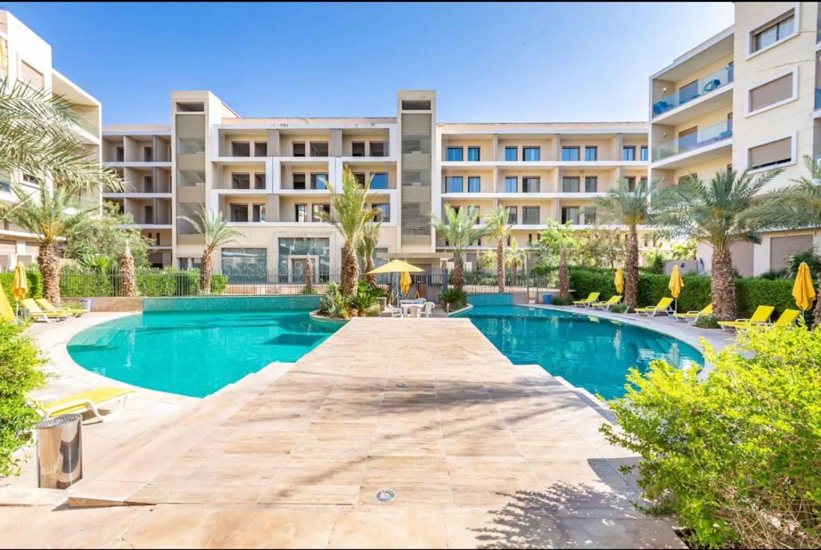 Appartement Luxueux Avec Piscine 10 Minutes Du Centre Ville Marrakesh Bagian luar foto